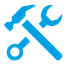 A blue hammer and wrench are on the ground.